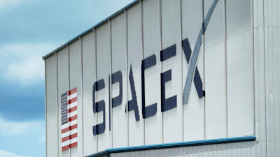 The SpaceX logo is displayed on a building, May 26, 2020, at the Kennedy Space Center in Cape Canaveral, Fla.