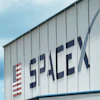 The SpaceX logo is displayed on a building, May 26, 2020, at the Kennedy Space Center in Cape Canaveral, Fla.