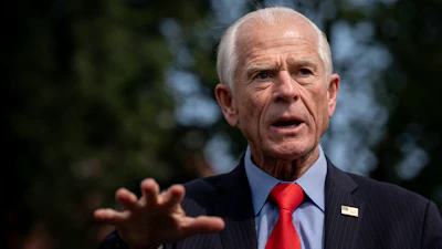White House trade counselor Peter Navarro speaks with reporters outside the White House, Aug. 11, 2026.