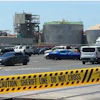 Yellow police tape is seen on May 27, 2026 outside the Longview, Wash. paper mill where a deadly chemical tank failure occurred.