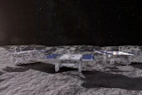 An illustration shows how the NASA CADRE rover team will explore the lunar surface.