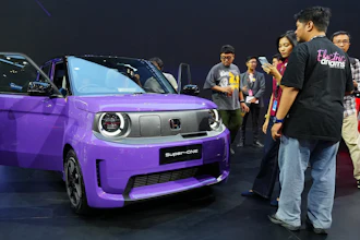 Visitors examine a Honda Super-One EV during the Indonesia International Auto Show organized by the Association of Indonesian Automotive Industries (GAIKINDO) in Tangerang, Indonesia, Thursday, July 30, 2026.