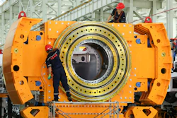 Workers install a tunnel‑boring machine at a factory in Jinhu county in eastern China's Jiangsu province on Aug. 25, 2026.