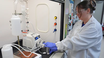 Stephanie Stoll starts a pump as part of an experiment studying the removal of PFAS from water samples at a U.S. Environmental Protection Agency lab in Cincinnati, April 10, 2024.