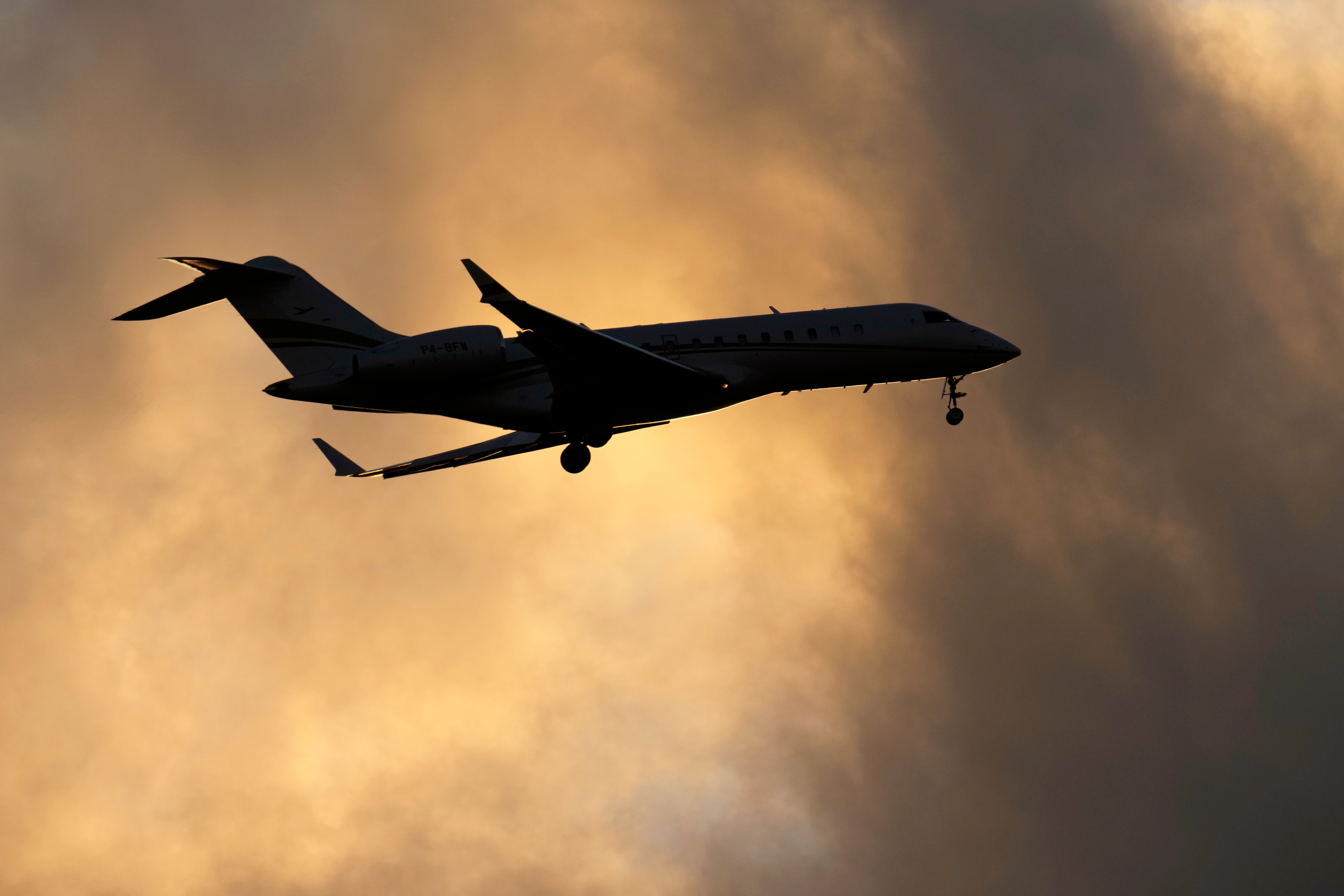 A Bombardier Global Express business jet approaches for landing in Lisbon, on June 13, 2023.