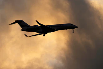A Bombardier Global Express business jet approaches for landing in Lisbon, on June 13, 2023.