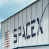 The SpaceX logo is displayed on a building, May 26, 2020, at the Kennedy Space Center in Cape Canaveral, Fla.