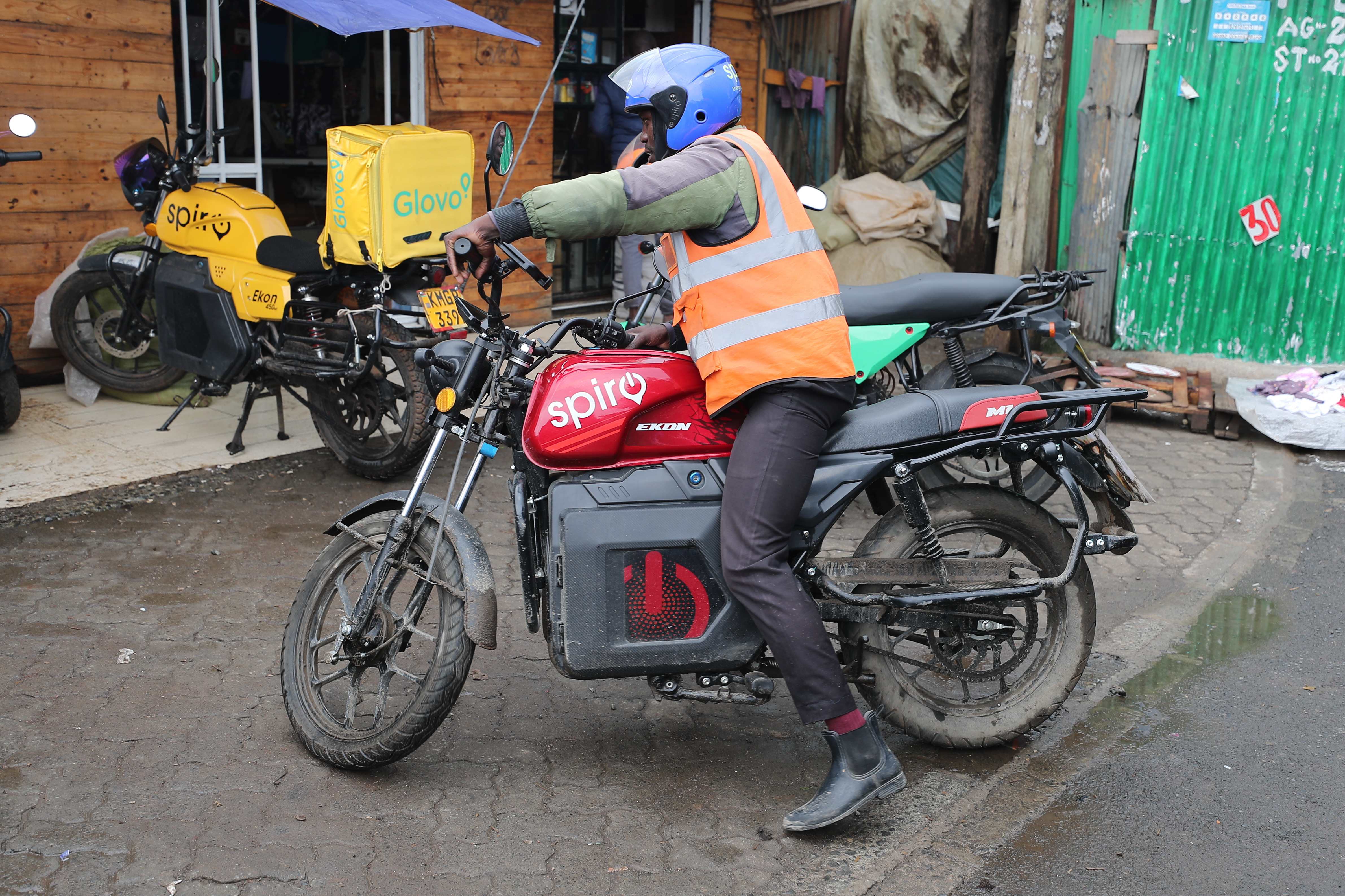 A rider sits on an electric Spiro motorcycle in Nairobi, Kenya, on Feb. 24, 2026.