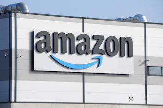 Amazon logo on industrial warehouse building exterior signage