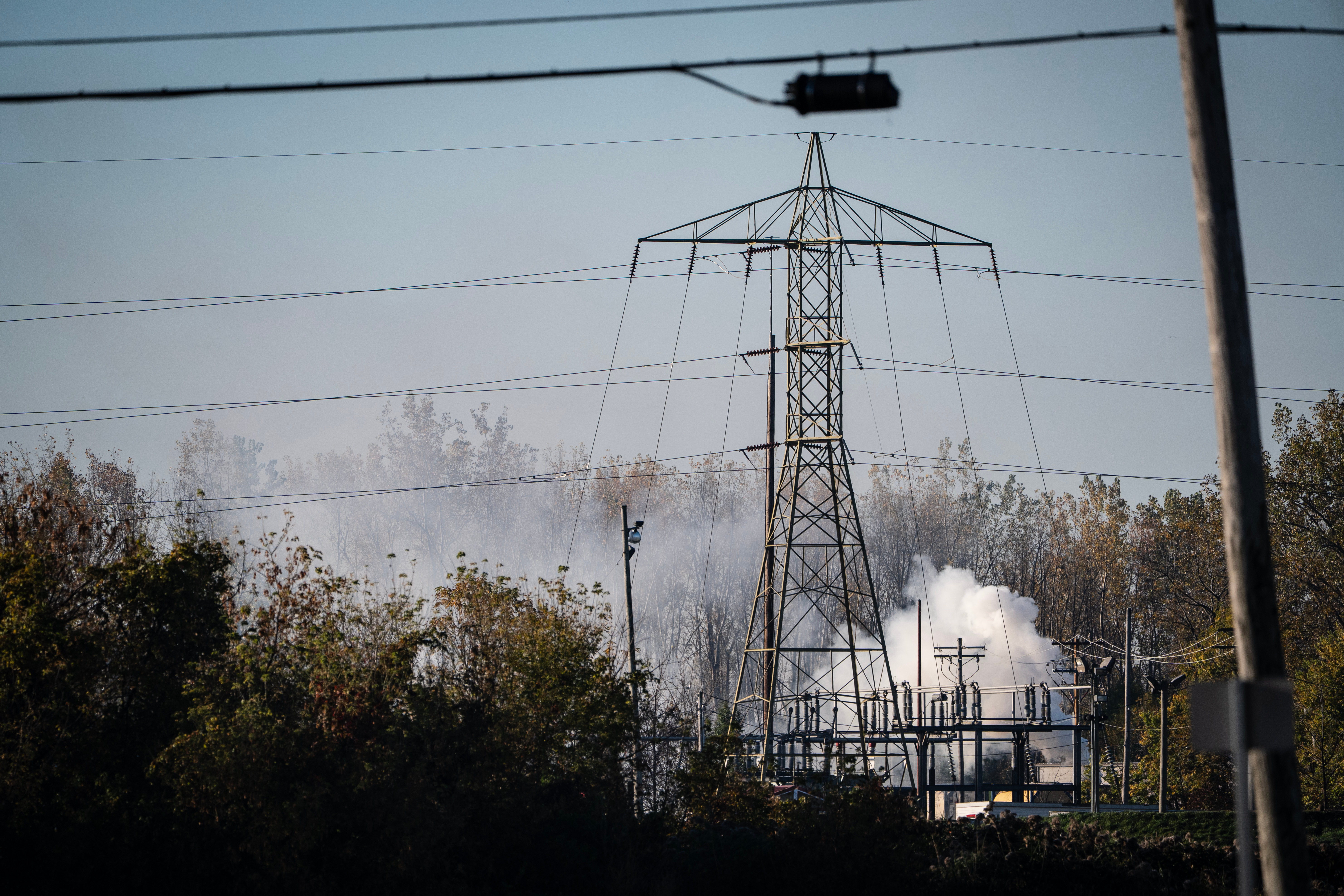A plume of smokes rises from MC Tank Transport Inc., Toledo, Ohio, Oct. 21, 2026.