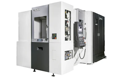OKUMA CNC machining center with white and black exterior, doors open showing internal mechanical components and control panels
