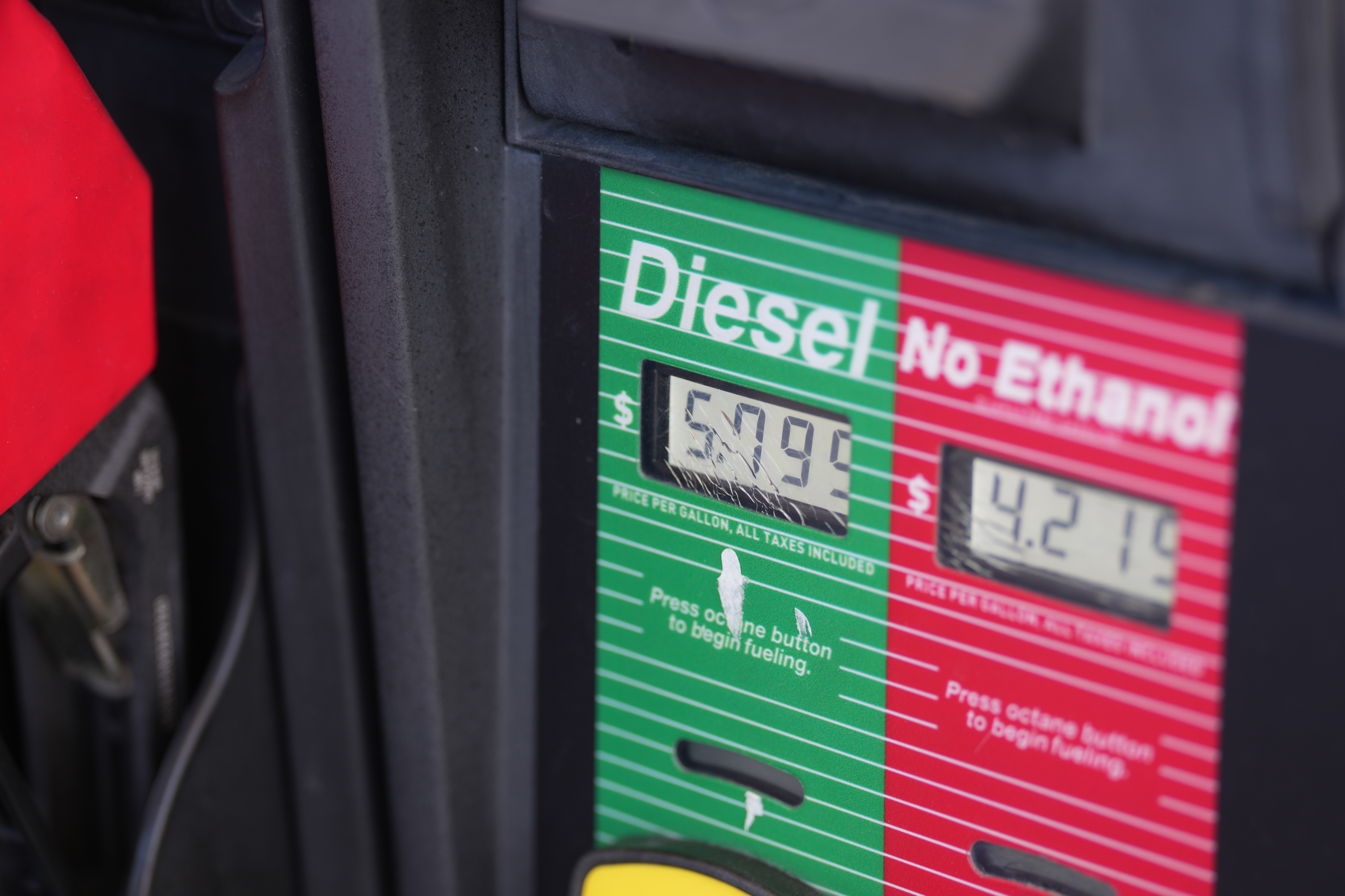 Gas station fuel pump display showing diesel and no ethanol options with price per gallon