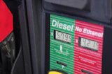 Gas station fuel pump display showing diesel and no ethanol options with price per gallon