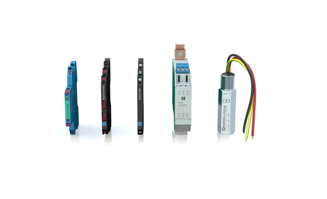 Five industrial electronic sensors and measurement devices displayed in a product lineup arrangement