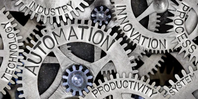 Interconnected gears and cogs with overlaid business and technology keywords representing automation and industrial innovation